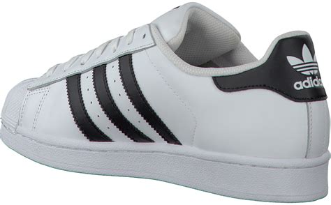 adidas schoenen heren wit donkerblauw|Witte sneakers .